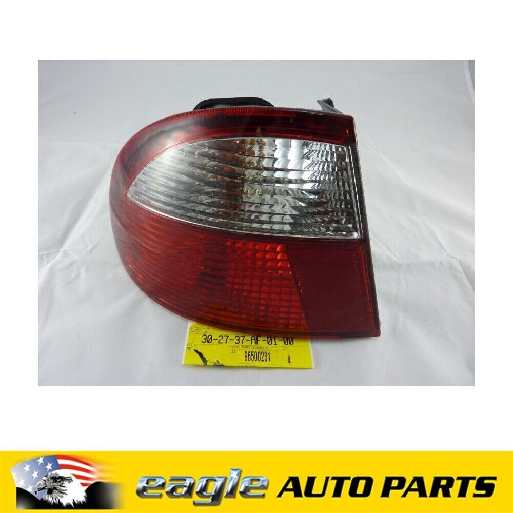 DAEWOO LANOS 97 - 03 LEFT HAND REAR TAIL LIGHT ASSEMBLY NOS GENUINE # 96500231